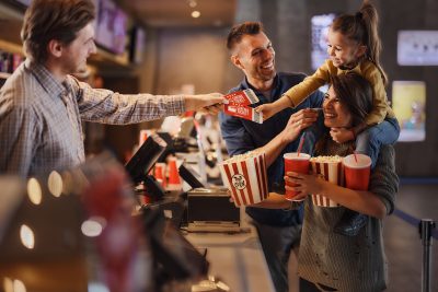 Parent and child at the movie theater